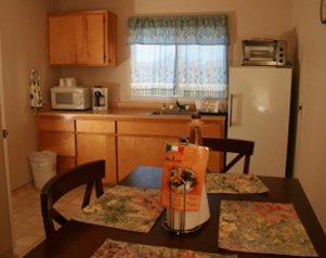 Kitchen Two Room Suite. Rooms vary in decor and layout.